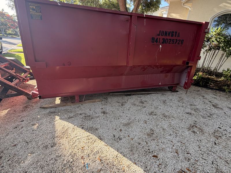 Roll-off dumpster ready for pickup in Manatee County